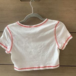 White crop top and a red sun print in the middle from H&M Size M